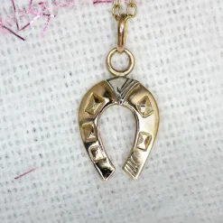 Pendentif or rose fer à cheval