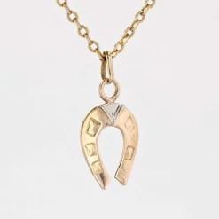 Pendentif or rose fer à cheval