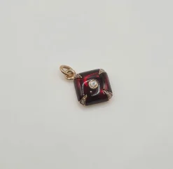 Pendentif or rose grenat et diamants