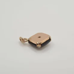 Pendentif or rose grenat et diamants