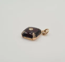 Pendentif or rose grenat et diamants