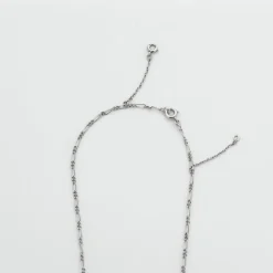 Pendentif platine et aigue-marine