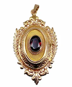 Pendentif porte souvenir ouvrant en or et grenat