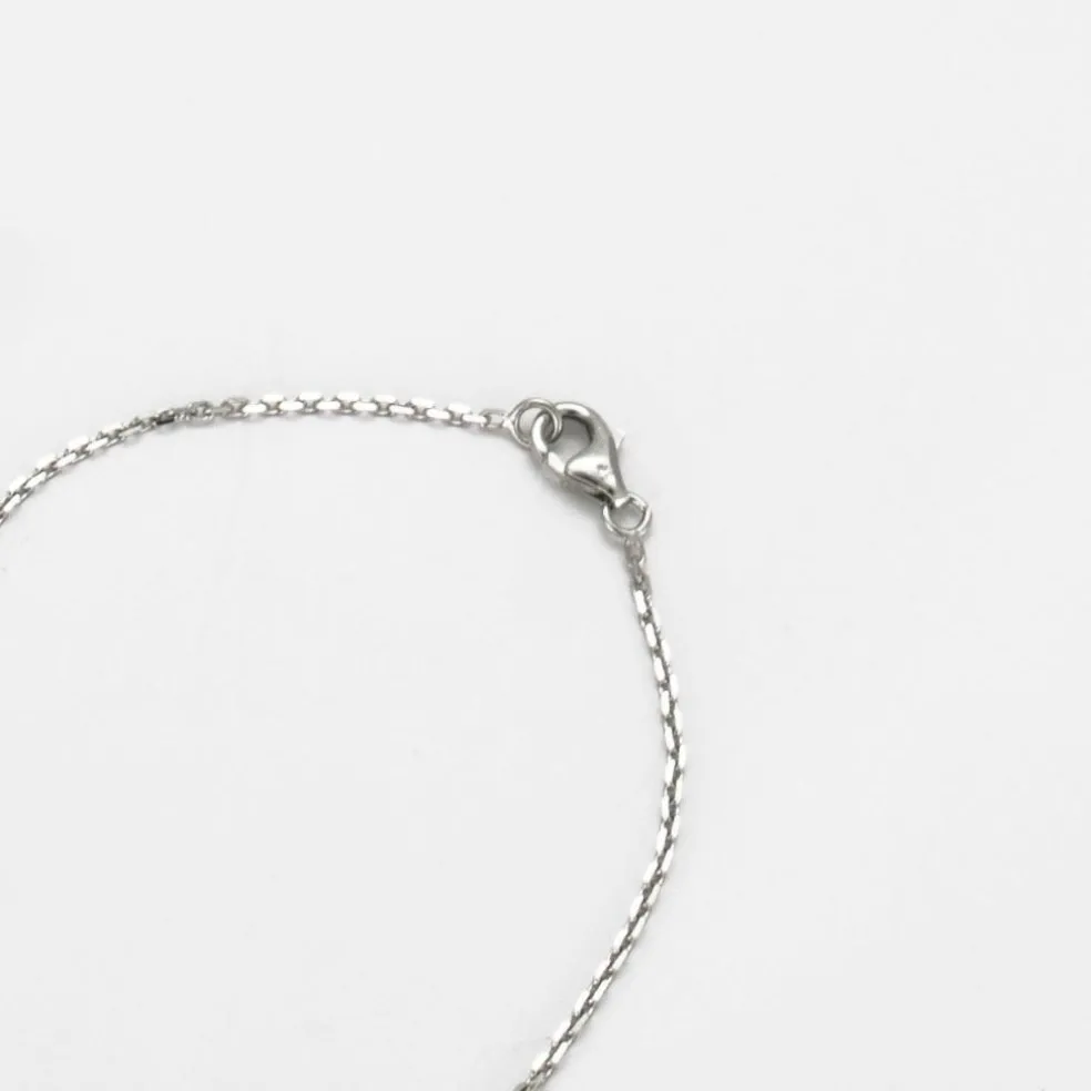 Pendentif sur chaîne 9 Diamants