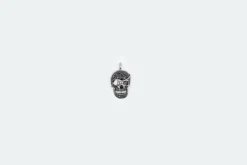 Pendentif tête de mort en or blanc avec pavé de diamants noirs