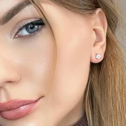 Puces d'oreilles or blanc diamants