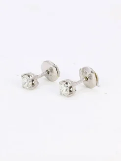 Puces d'oreilles or blanc diamants ronds 0.7 carat