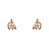 Puces d'oreilles or jaune pierres blanches