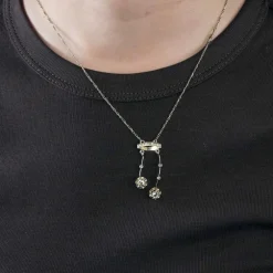 Ravissant collier "Négligé" en or deux tons diamants