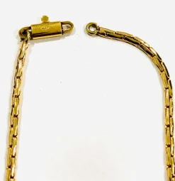 Ravissant collier or jaune et diamants entrelacés.