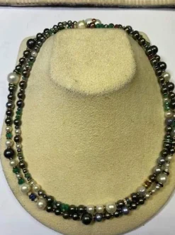 Sautoir perles et rubis, diamants et saphirs