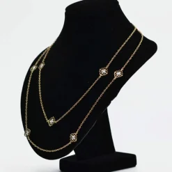 Sautoir diamants ors jaune et blanc arabesques