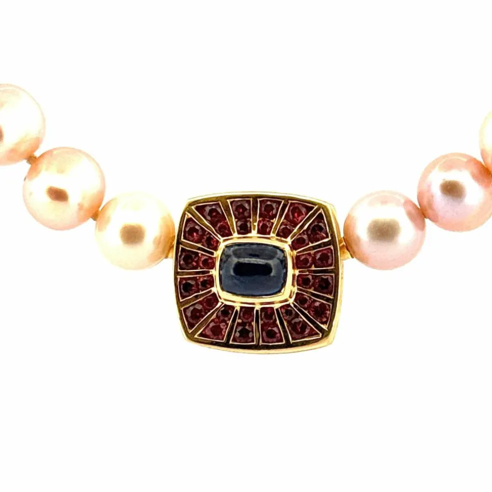 Sautoir en perles motif or, saphir et grenats