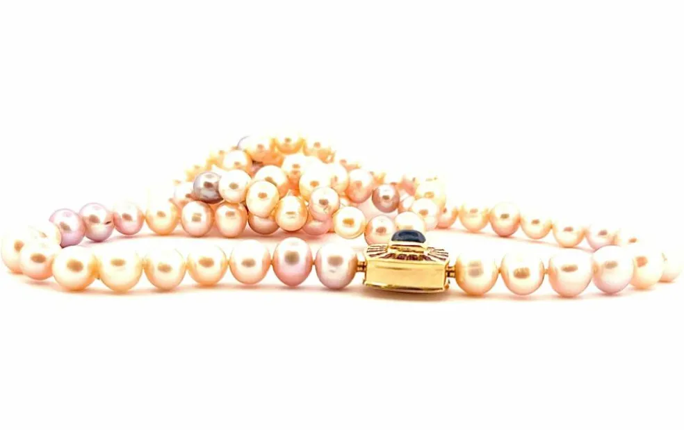 Sautoir en perles motif or, saphir et grenats