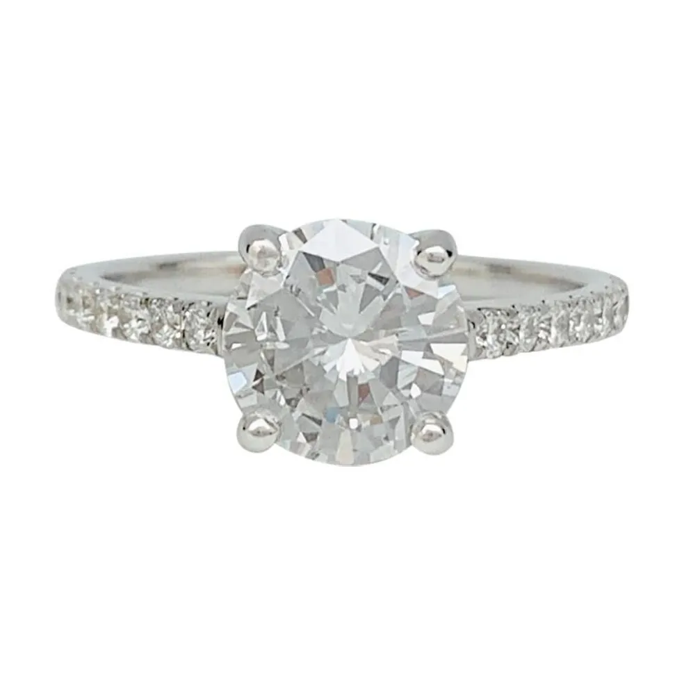 Solitaire accompagné, diamant 1,53 carat.