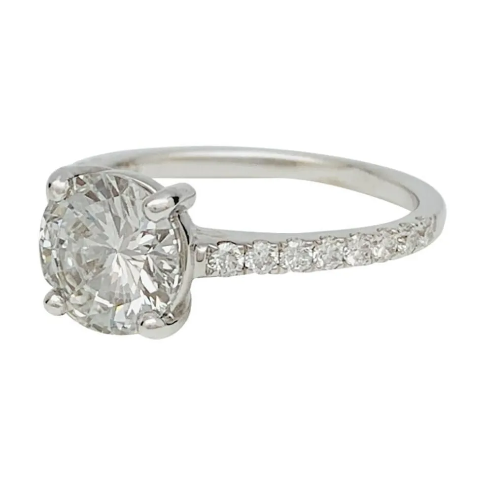 Solitaire accompagné, diamant 1,53 carat.