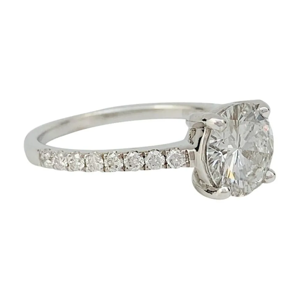 Solitaire accompagné, diamant 1,53 carat.