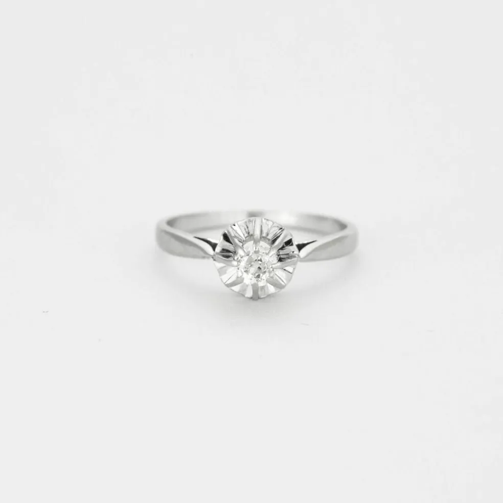 Solitaire en or gris