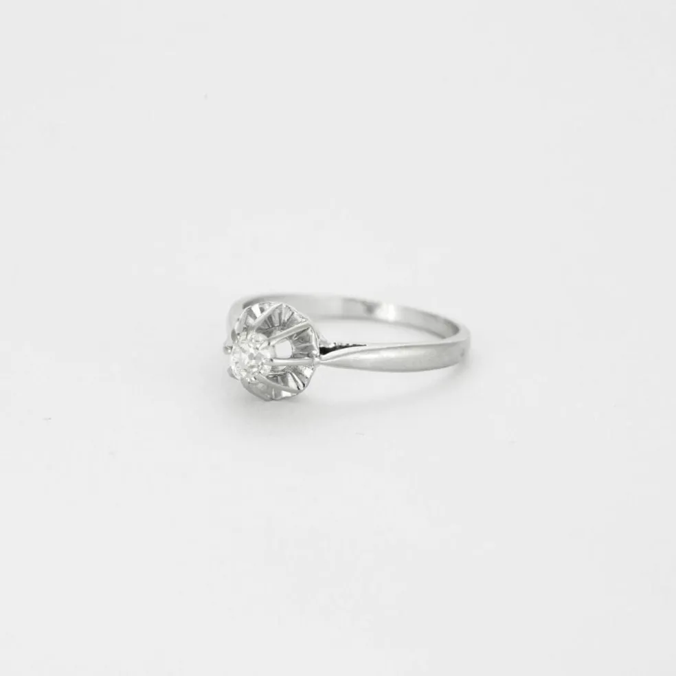 Solitaire en or gris