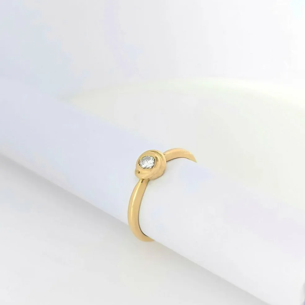 Solitaire en or jaune et diamant
