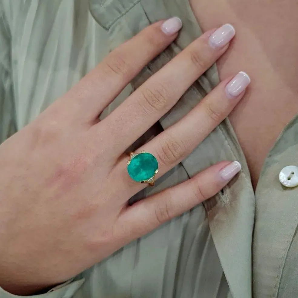 Solitaire émeraude diamants or jaune 18 carats