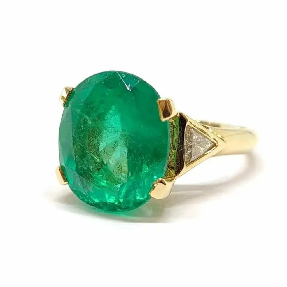 Solitaire émeraude diamants or jaune 18 carats