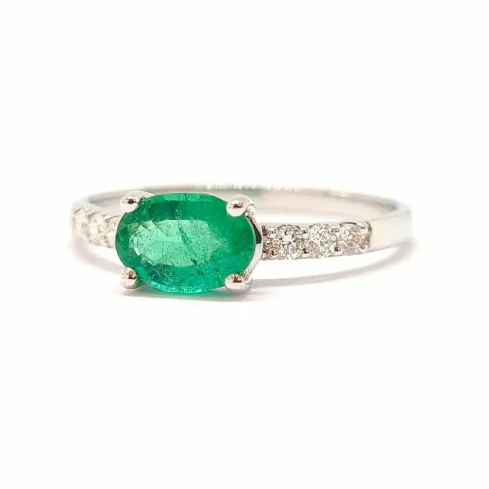 Solitaire émeraude diamants or blanc 18 carats