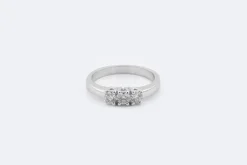 Trilogie en or blanc et diamants