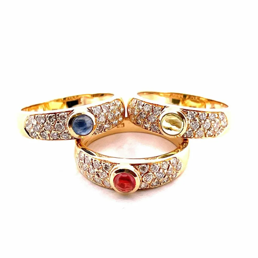 Trio de bagues or jaune diamants pierres de couleur