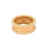 Van Cleef & Arpels Bague perlé en or rose satiné.