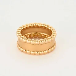 Van Cleef & Arpels Bague perlé en or rose satiné.